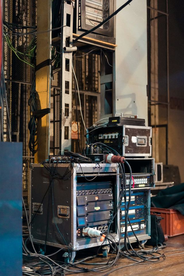 Audio racks and road cases with cabling set up backstage