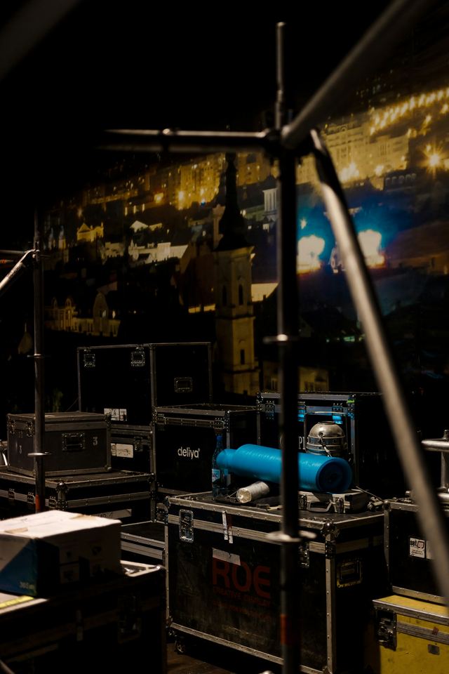 Road cases and gear staged backstage